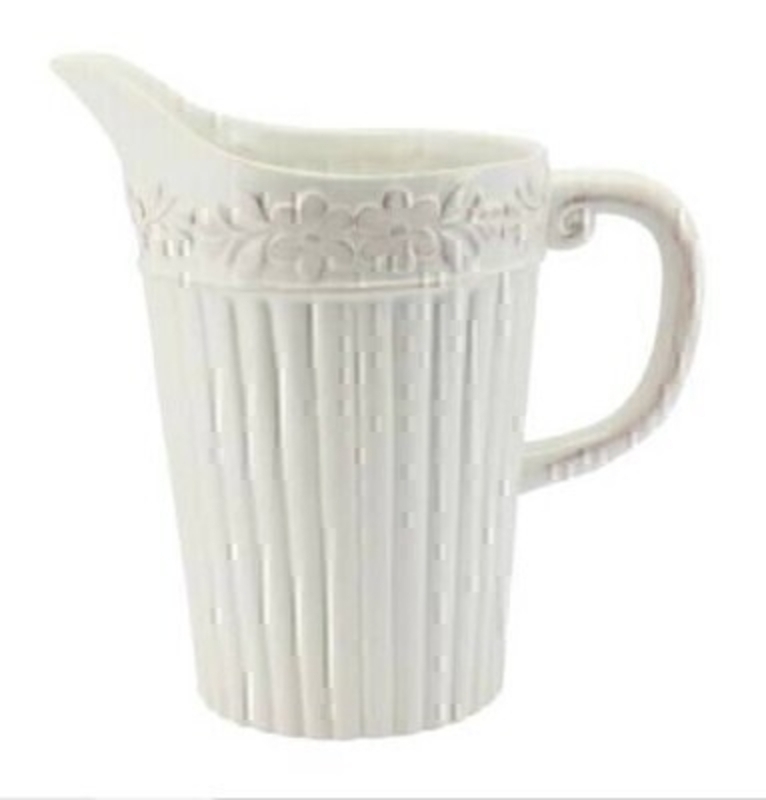 Large white rustic ribbed ceramic pitcher jug with flower design by designer Gisela Graham.  This item would look great on display in your kitchen or would make an ideal new home gift.  Size (LxWxD) 23cm x 22cm x 14cm.